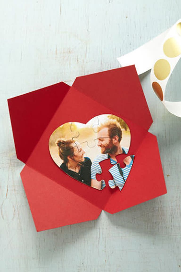 <p>Turn a family photo into a little puzzle to show how they make up your whole heart. Here are the steps from our friends at <a href="https://www.countryliving.com/diy-crafts/g1093/valentine-day-crafts" rel="nofollow noopener" target="_blank" data-ylk="slk:Country Living;elm:context_link;itc:0;sec:content-canvas" class="link "><em>Country Living</em></a>:</p><ol><li>Start with an 8-piece heart-shaped puzzle for just $1.75. Then, choose your digital image — resize if needed, to at least 6"W x 5"H — and print onto matte photo paper.</li><li>Work with your kids to put the puzzle together and lay on top of your photo, then trace around the outside of the puzzle with a pencil and cut out the heart shape.</li><li>Turn your photo and all of the puzzle pieces face down. Position the bottom puzzle piece along the corresponding part of the back of the photo. Trace the puzzle piece with a pencil, then remove. Repeat with each of the remaining puzzle pieces.</li><li>Use small scissors to carefully cut out each jigsaw shape from your photo. With an acid-free glue stick, mount each cutout, face up, to its matching puzzle piece, also face up. Once dry, your kids can put together the puzzle again, this time to complete the photo.</li></ol><p><strong><a class="link " href="https://go.redirectingat.com?id=74968X1596630&url=https%3A%2F%2Fwww.etsy.com%2Flisting%2F60468432%2Fheart-shaped-jigsaw-puzzle-8-piece-heart&sref=https%3A%2F%2Fwww.womansday.com%2Fhome%2Fcrafts-projects%2Fg2138%2Fvalentines-day-crafts-for-kids%2F" rel="nofollow noopener" target="_blank" data-ylk="slk:Shop Now;elm:context_link;itc:0;sec:content-canvas">Shop Now</a><br></strong></p>