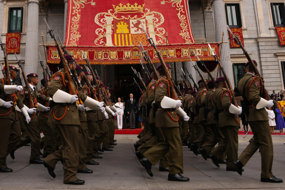 Princess Leonor, next to Spanish King Felipe VI, attends a military parade after swearing allegiance to the Constitution during a gala event that makes her eligible to be queen one day, in Madrid on Tuesday, Oct. 31 2023. The heir to the Spanish throne, Princess Leonor, has sworn allegiance to the Constitution on her 18th birthday. Tuesday's gala event paves the way to her becoming queen when the time comes. Leonor is the eldest daughter of King Felipe and Queen Letizia. (AP Photo/Manu Fernandez)