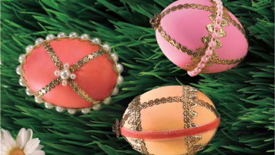 Cool Easter egg designs: Three pink and orange Easter eggs decorated with gold ribbon, faux pearl trim and faux pearls