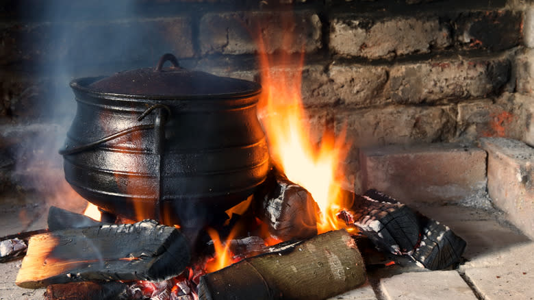 iron coal pot over fire