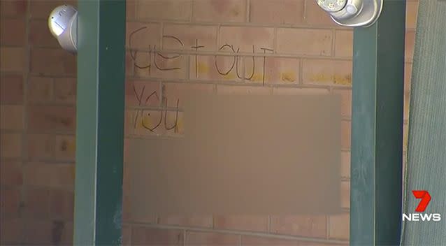 An abusive message on the side of the house. Picture: 7 News