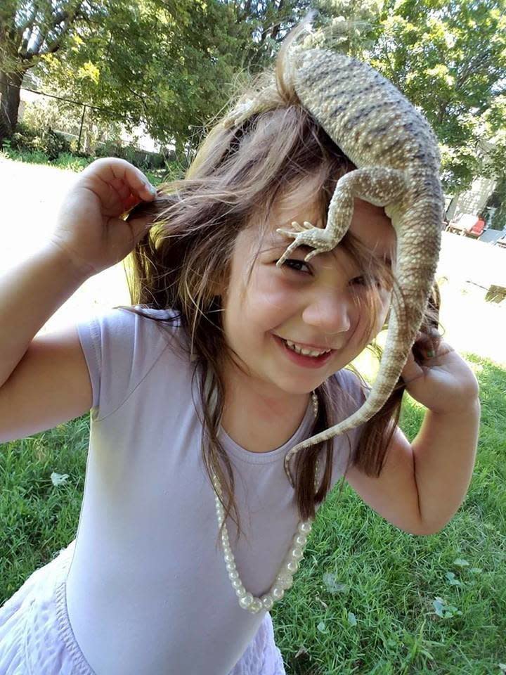 "This is my daughter. She is 4 years old and her interests include everything scaly or creepy! She particularly loves her lizard Pascal who is a 1-year-old bearded dragon. She loves sharing him with people, but most of her little girl friends are less than enthused."