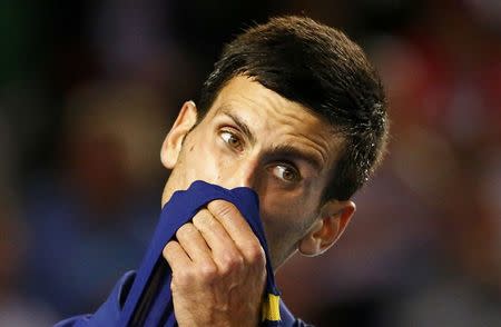 Serbia's Novak Djokovic reacts during his final match against Britain's Andy Murray at the Australian Open tennis tournament at Melbourne Park, Australia, January 31, 2016. REUTERS/Thomas Peter