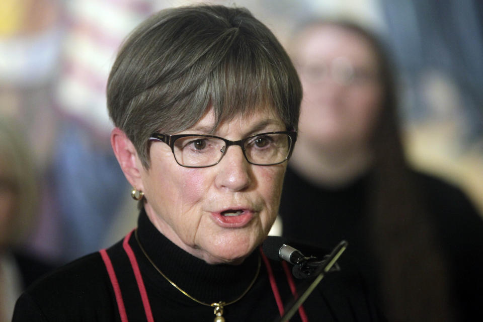FILE - Kansas Gov. Laura Kelly speaks during a rally for teachers and education funding, April 25, 2023, at the Statehouse in Topeka, Kansas. The Democratic governor declared Thursday, June 29, that the state will keep allowing transgender residents to alter their driver's licenses and birth certificates, despite a new law aimed at preventing it. (AP Photo/John Hanna, File)