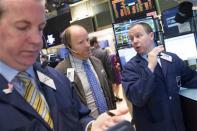 A trader works on the floor of the New York Stock Exchange April 21, 2014. REUTERS/Brendan McDermid