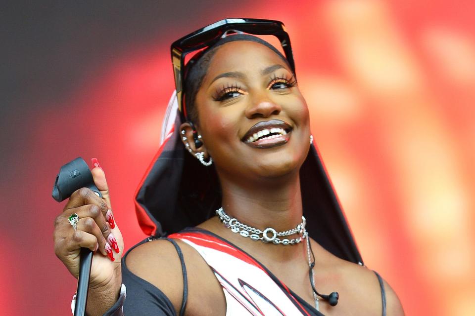 Tems performs on the Other stage during day four of Glastonbury Festival at Worthy Farm, Pilton on June 25, 2022 in Glastonbury, England. The 50th anniversary of Glastonbury’s inaugural event in 1970 was postponed twice after two cancelled events, in 2020 and 2021, due to the Covid pandemic. The festival, founded by farmer Michael Eavis, is the largest greenfield music and performing arts festival in the world.