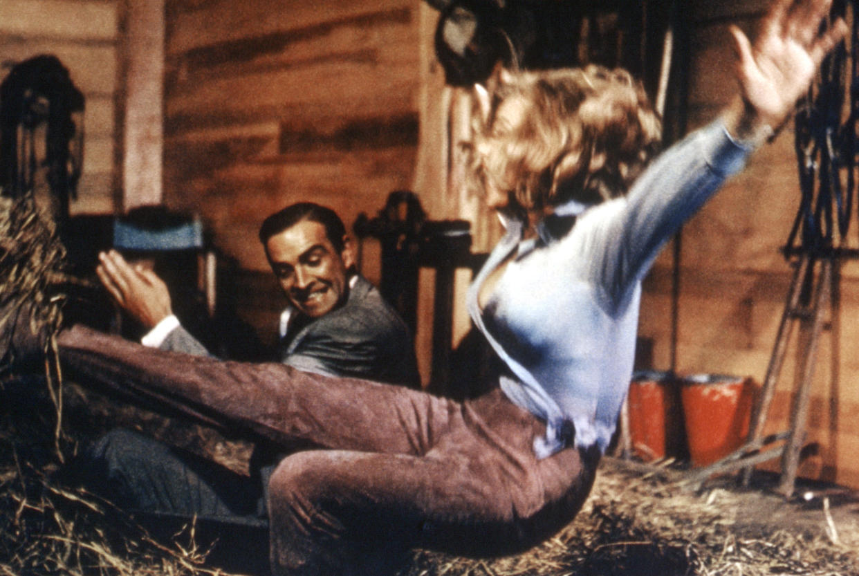 Connery and Honor Blackman in a controversial scene from Goldfinger (Photo: Courtesy Everett Collection)