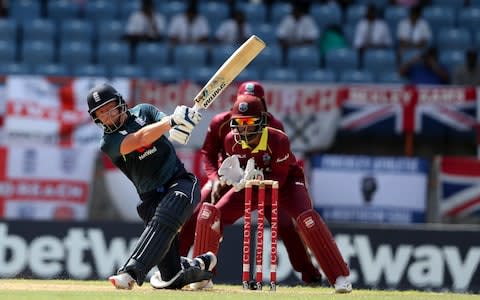 Jonny Bairstow clubs the ball away for six - Credit: ap