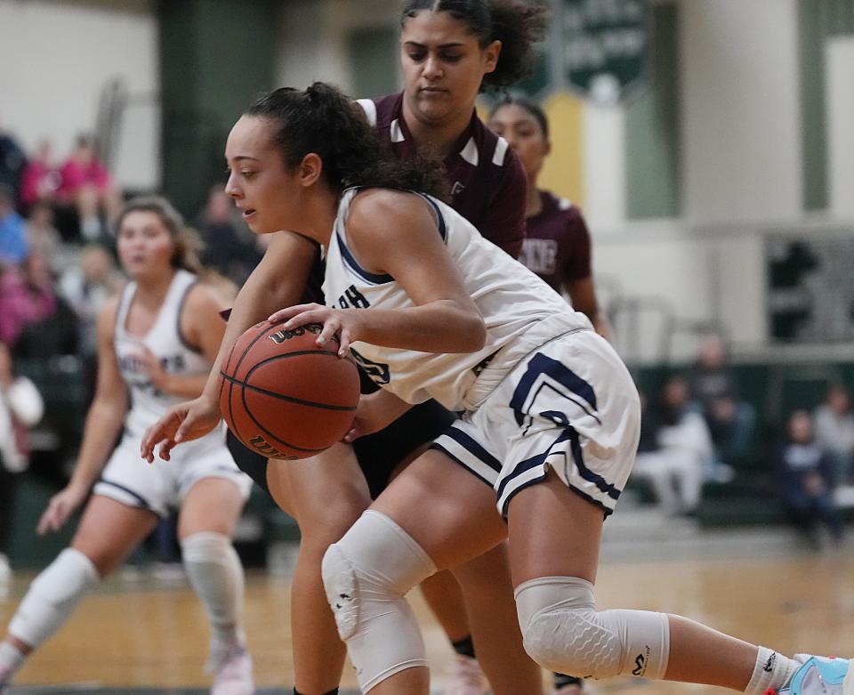 Madison Jenisch of Randolph is guarded by Menna Hafiz of Bayonne in the first half as Bayonne defeated Randolph and won the 2022 Ridge Holiday Invitational Girls Basketball Tournament final played in Basking Ridge, NJ on December 30, 2022.