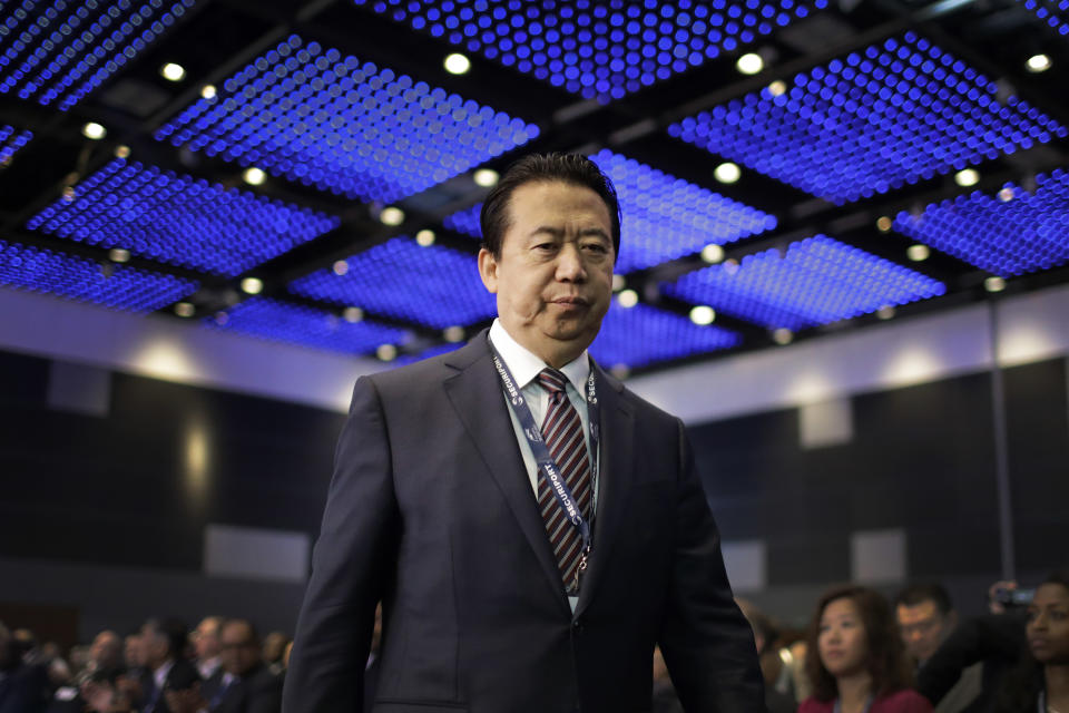 FILE - In this July 4, 2017 file photo, Interpol President, Meng Hongwei, walks toward the stage to deliver his opening address at the Interpol World congress in Singapore. A French judicial official says Friday Oct.5, 2018 the president of Interpol has been reported missing after traveling to China. (AP Photo/Wong Maye-E, File)