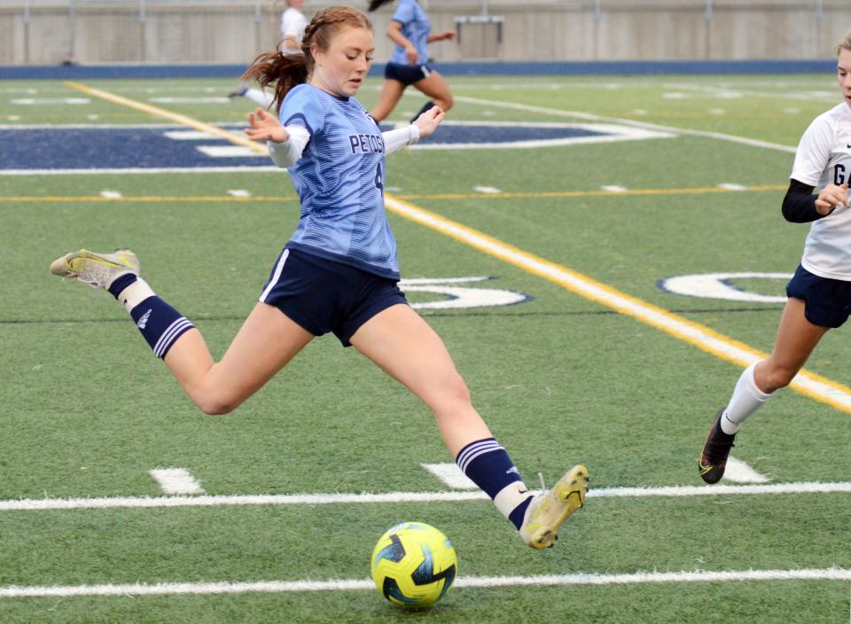 Petoskey's Anna Dundon loads up for a shot down the field during the first half against Gaylord Thursday.