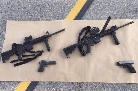 Weapons confiscated from Wednesday's attack in San Bernardino, California are shown in this San Bernardino County Sheriff Department handout photo from their Twitter account released to Reuters December 3, 2015. REUTERS/San Bernardino County Sheriffs Department/Handout