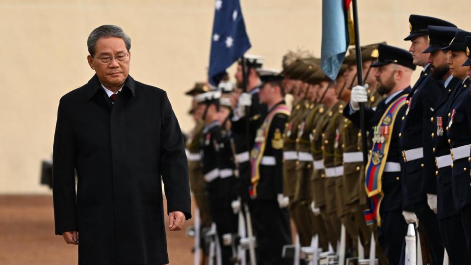 Chinese Premier Li Qiang inspects a guard of honour  Parliament House 