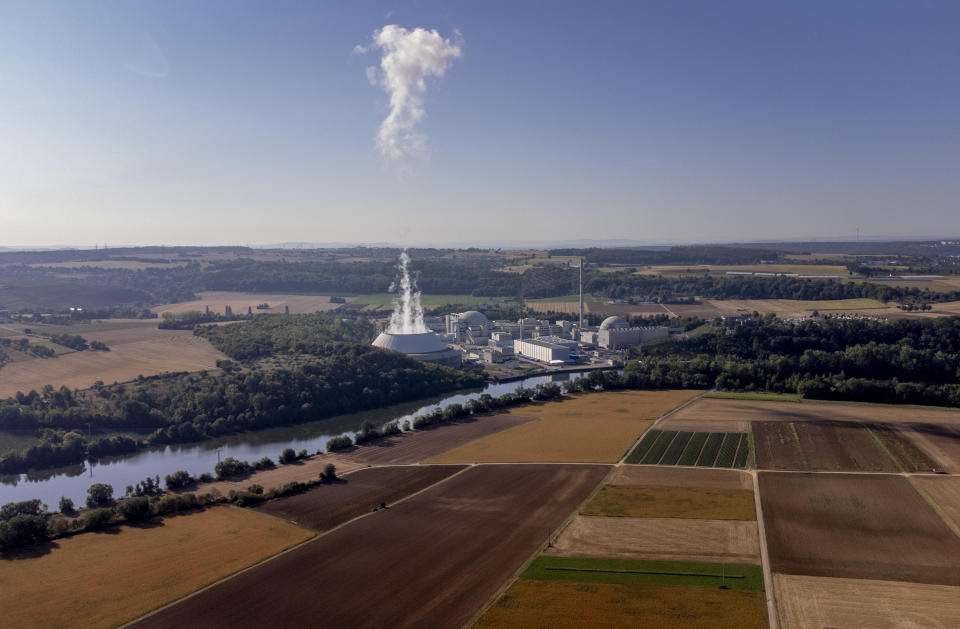 FILE - Smoke rises from the nuclear power plant of Nerckarwestheim in Neckarwestheim, Germany, on Aug. 22, 2022. (AP Photo/Michael Probst, File)