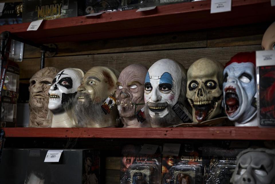 Horror movie merchandise and memorabilia are displayed for sale at We Slaughter BBQ on Oct. 27, 2023 in Bastrop. The roadside rest stop and tourist attraction, now restored, is one of several Central Texas locations where the 1974 film Texas Chainsaw Massacre was filmed.    