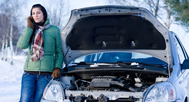 Winter car breakdown - woman call for help, road assistance