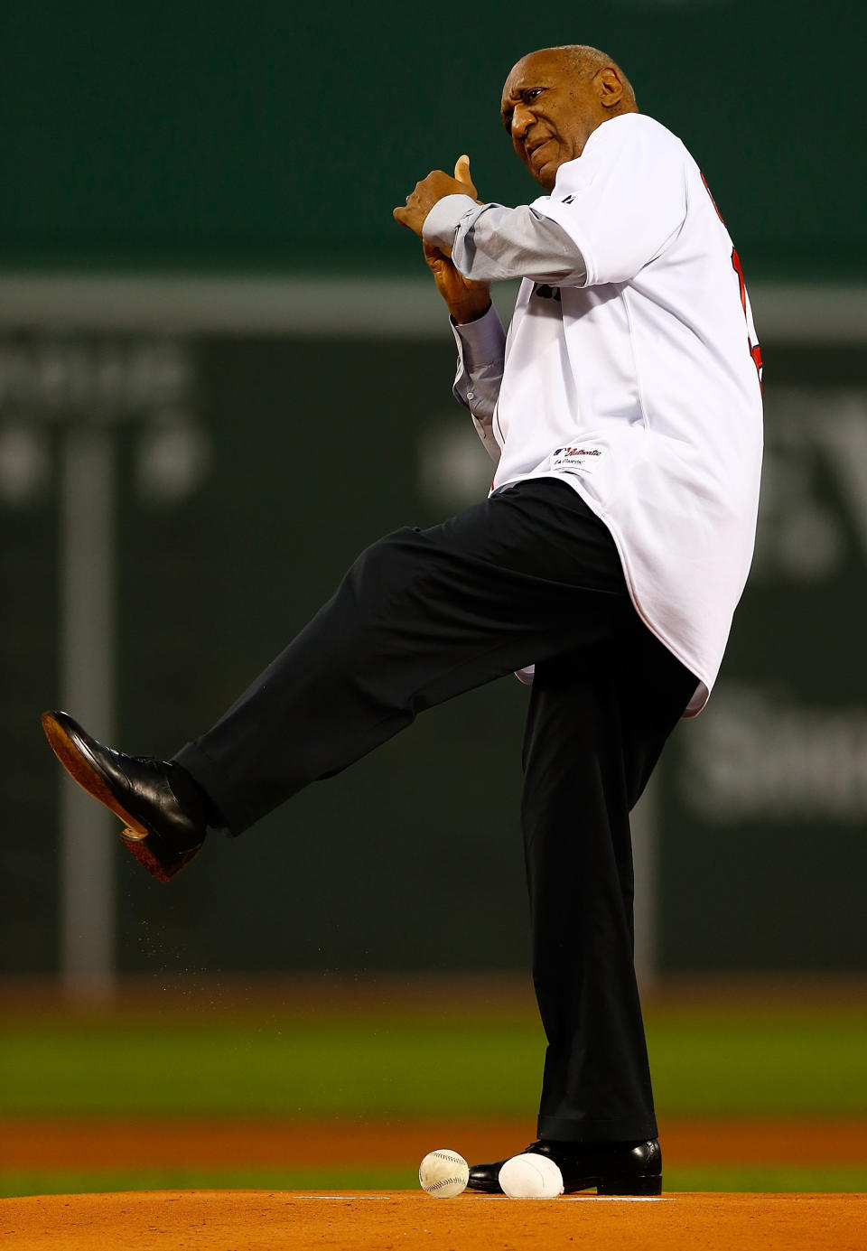 BOSTON, MA - SEPTEMBER 13:  Actor Bill Cosby throws out the first pitch prior to the game between the Boston Red Sox and the New York Yankees on September 13, 2012 at Fenway Park in Boston, Massachusetts.  (Photo by Jared Wickerham/Getty Images)