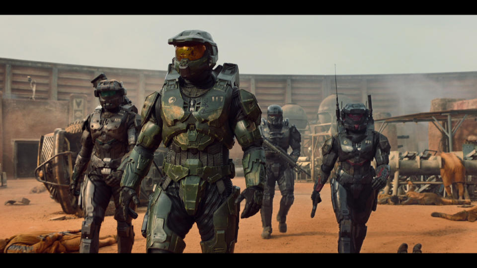 Meet the super-soldiers of Halo: Schreiber as Master Chief (center), Kate Kennedy as Kai (l), Bentley Kalu as Vannak (rear), and Natasha Culzac as Riz (r). (Photo: Paramount+)