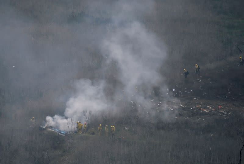 LA county firefighters on the scene of a helicopter crash that reportedly killed Kobe Bryant in Calabasas