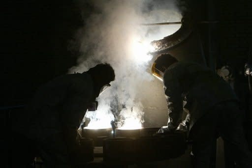 Two Iranians technicians at the Isfahan nuclear facility. The head of the UN nuclear agency has urged Iran to sign a deal allowing greater clarity on its disputed nuclear drive and announced that new talks with Tehran would be held this week