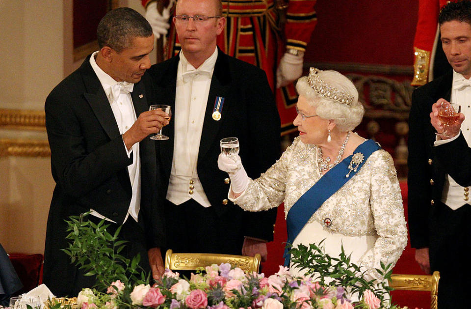 Britain's Queen Elizabeth II and US President Barack Obama share a toast during a State Banquet in Buckingham Palace, on the first day of the President's three-day state visit to the UK on Tuesday May 24, 2011.