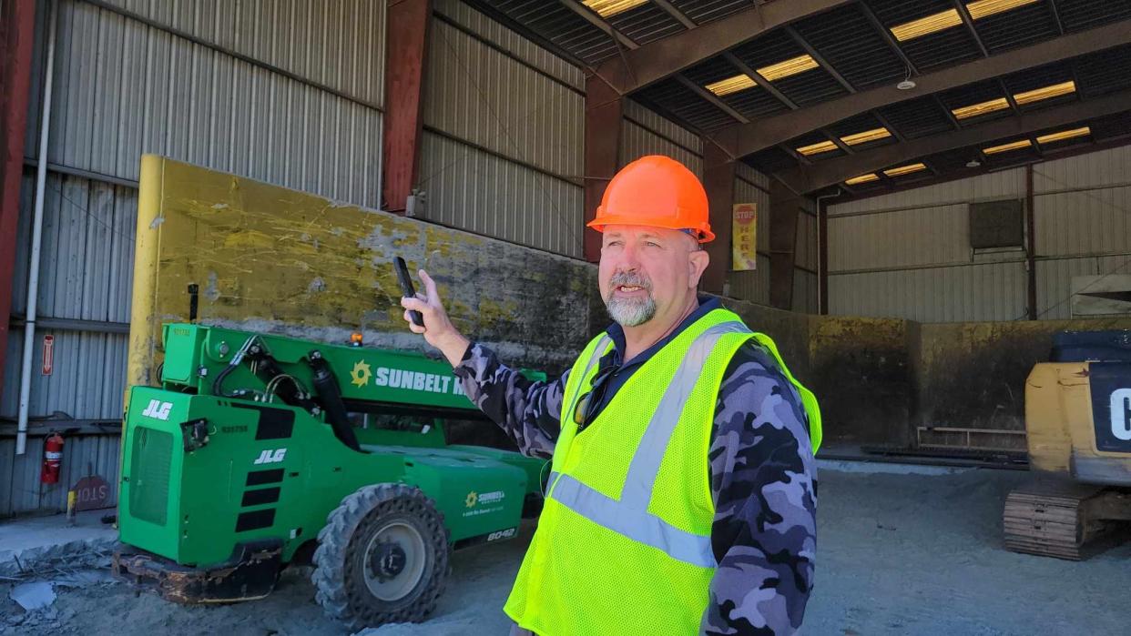 Henderson County Solid Waste Director Greg Wiggins talks about the process of compacting trash on April 25 at the Transfer Station.