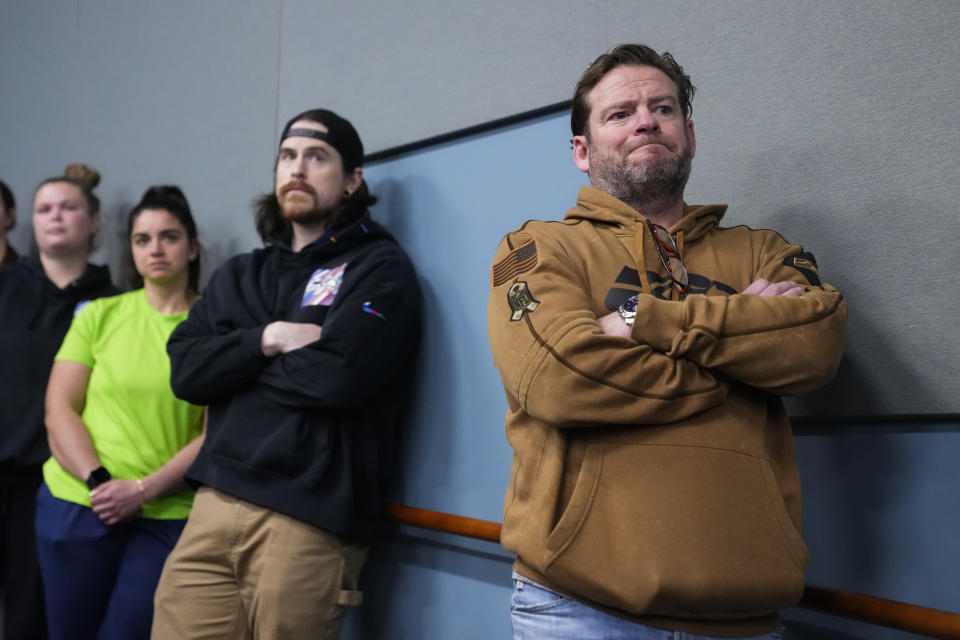 Seattle Seahawks general manager John Schneider listens as head coach Pete Carroll speaks during a media availability after it was announced he will not return as head coach next season, Wednesday, Jan. 10, 2024, at the NFL football team's headquarters in Renton, Wash. Carroll will remain with the organization as an advisor. (AP Photo/Lindsey Wasson)