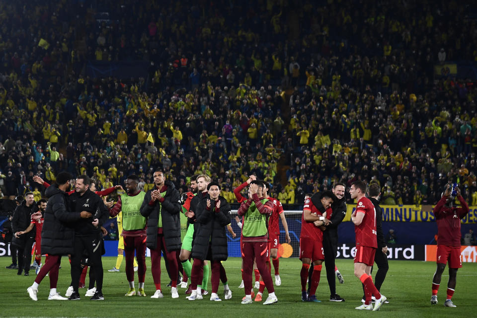 Liverpool's players celebrate after the Champions League semi final, second leg soccer match between Villarreal and Liverpool at the Ceramica stadium in Villarreal, Spain, Tuesday, May 3, 2022. (AP Photo/Jose Breton)