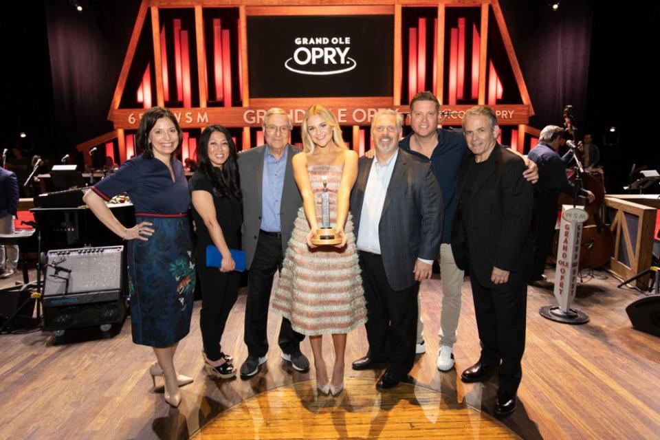 Grand Ole Opry's Sally Williams, Black River Entertainment's Kim and Terry Pegula, Kelsea Ballerini, Black River Entertainment's Gordon Kerr, Sandbox Entertainment's Jason Owen and Black River Entertainment's Rick Froio | Chris Hollo/Grand Ole Opry