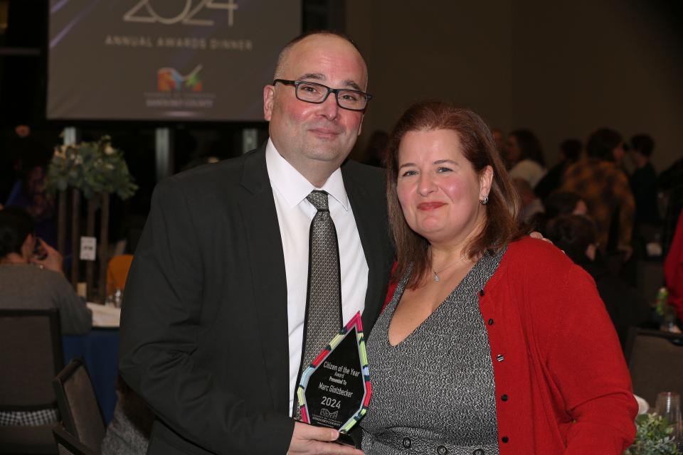 Marc Glotzbecker, winner of the 2024 Citizen of the Year Award, stands with his wife Pam, at the annual Sandusky County Chamber of Commerce dinner.