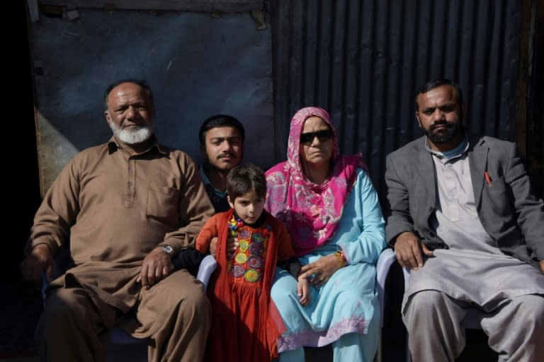 Indian Kashmiri Muhammad Ashraf sees his family for the first time in 26 years, after they were divided by insurgency in disputed Kashmir