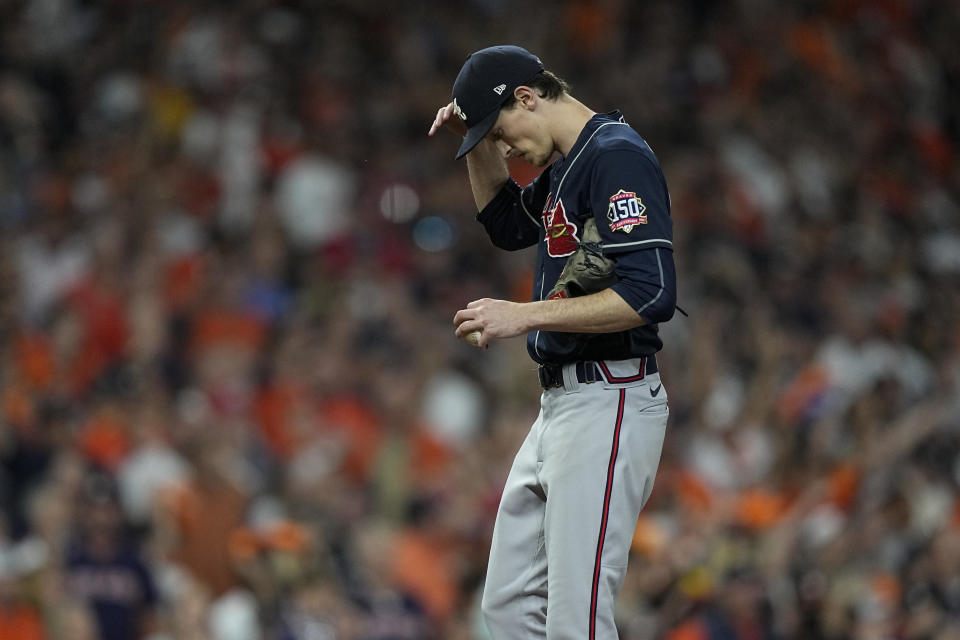 Atlanta Braves starting pitcher Max Fried reacts after giving up a two-run single by Houston Astros' Martin Maldonado during the second inning in Game 2 of baseball's World Series between the Houston Astros and the Atlanta Braves Wednesday, Oct. 27, 2021, in Houston. (AP Photo/David J. Phillip)
