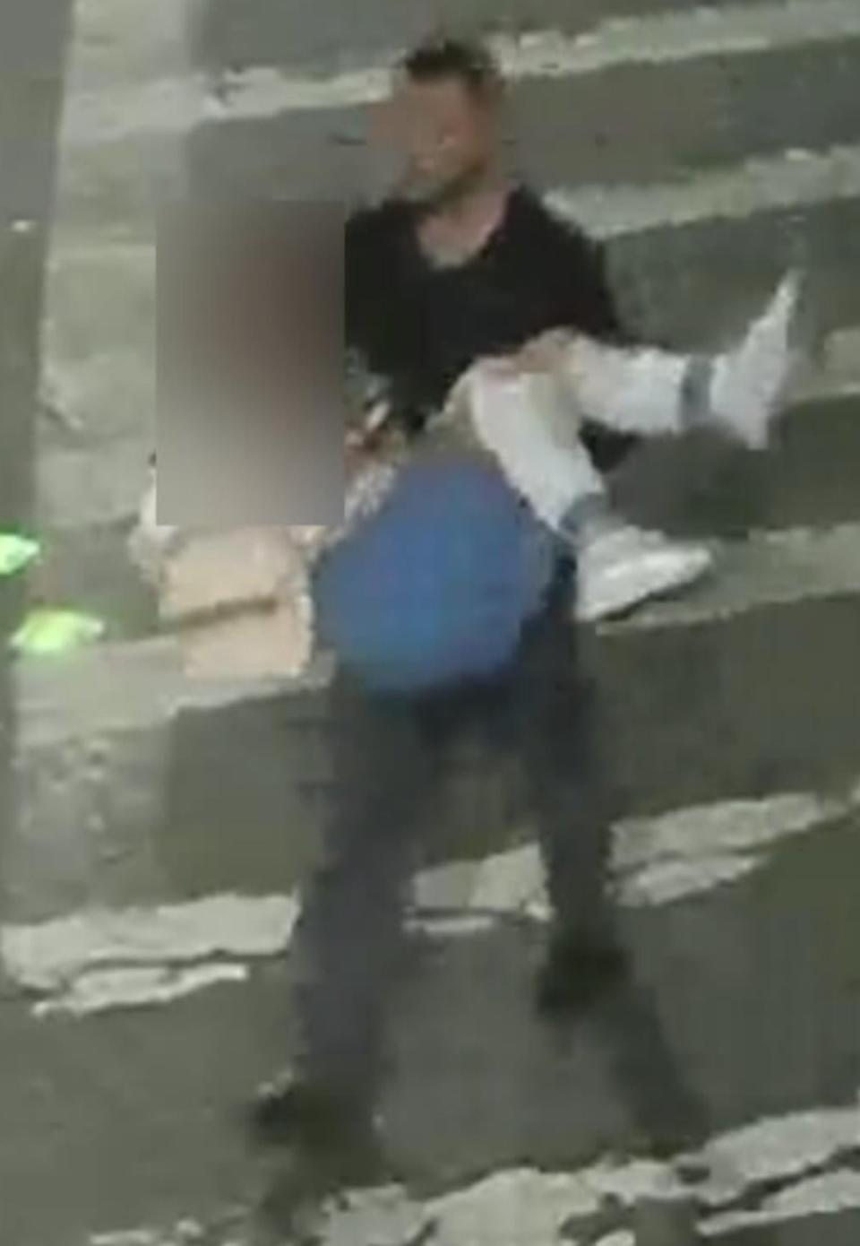 A second image shows the suspect carrying the victim (NYPD)