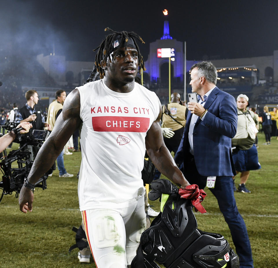 FILE - In this Nov. 19, 2018, file photo, Kansas City Chiefs wide receiver Tyreek Hill walks off the field after an NFL football game against the Los Angeles Rams, in Los Angeles. A criminal investigation into allegations that Kansas City Chiefs receiver Tyreek Hill’s son was abused is no longer active but he and his fiancee remain under investigation by Kansas child welfare officials. Johnson County District Attorney Steve Howe told The Kansas City Star Friday, June 7, 2019, that he would re-evaluate his decision if new evidence emerges. (AP Photo/Kelvin Kuo, File)