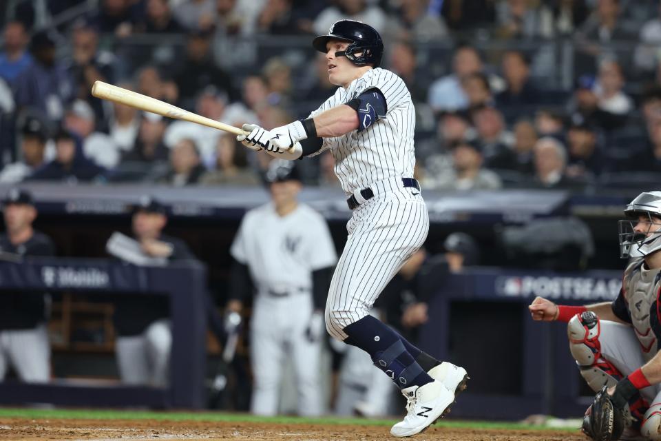 New York Yankees center fielder Harrison Bader (22) hits a home run during the third inning against the Cleveland Guardians in game one of the ALDS for the 2022 MLB Playoffs at Yankee Stadium.