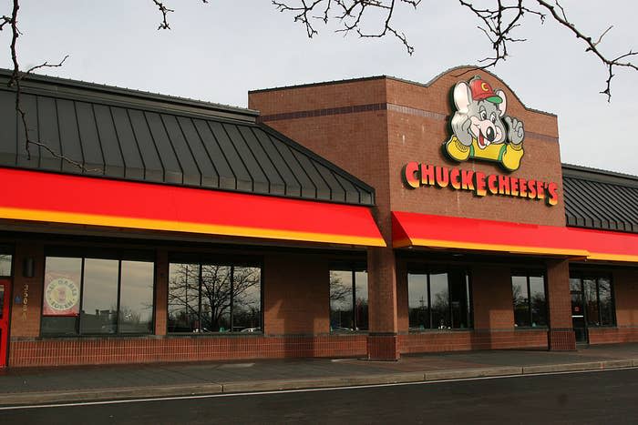 Exterior view of Chuck E. Cheese's restaurant facade with brand logo