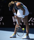 Estonia's Anett Kontaveit reacts after losing a point to Romania's Simona Halep during their quarterfinal match at the Australian Open tennis championship in Melbourne, Australia, Wednesday, Jan. 29, 2020. (AP Photo/Andy Brownbill)