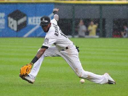 Jul 18, 2015; Chicago, IL, USA; Chicago White Sox shortstop Alexei Ramirez (10) dives for and misses a single off the bat of Kansas City Royals right fielder Alex Rios (not pictured) during the eighth inning at U.S Cellular Field. Mandatory Credit: Dennis Wierzbicki-USA TODAY Sports