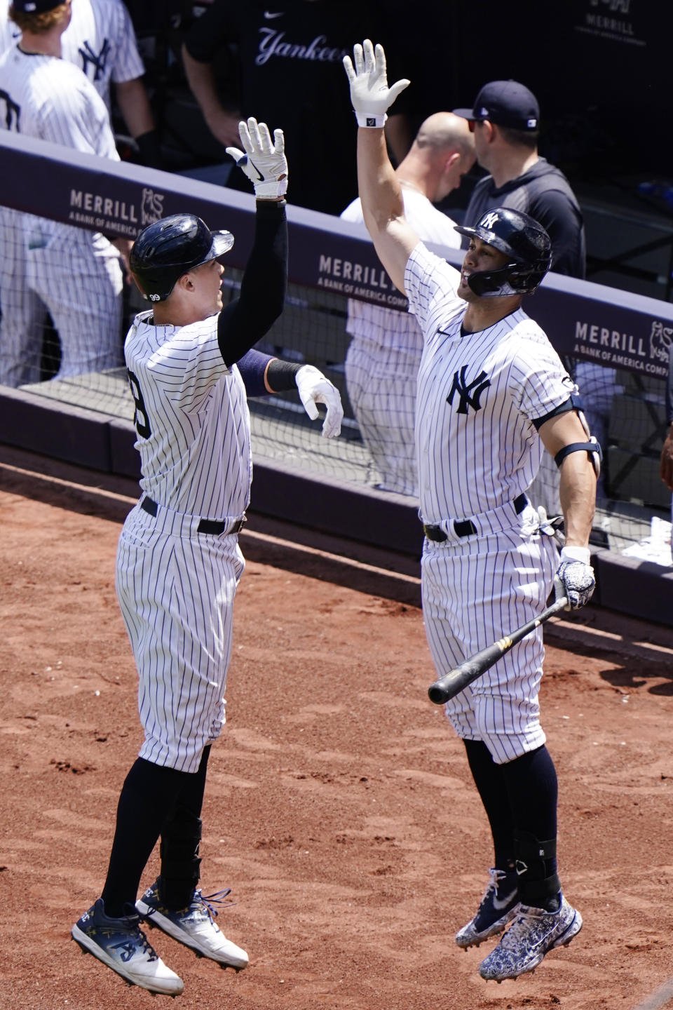 New York Yankees Aaron Judge, left, celebrates with on-deck batter and designated hitter Giancarlo Stanton during the first inning a baseball game against the Kansas City Royals, Thursday, June 24, 2021, at Yankee Stadium in New York. (AP Photo/Kathy Willens)