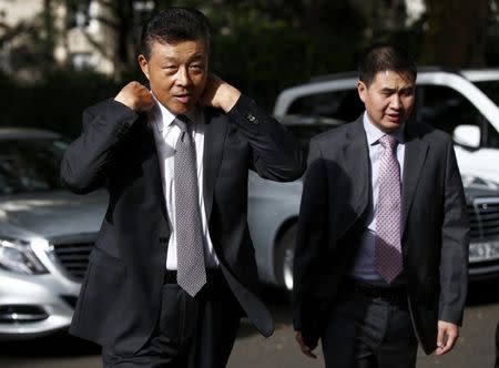 China's ambassador to Britain Liu Xiaoming arrives at 10 Carlton House Terrace in central London, where representatives from Britain, China, France and energy company EDF will sign an agreement to build and operate a new nuclear power station at Hinkley Point, Britain, September 29, 2016. REUTERS/Peter Nicholls