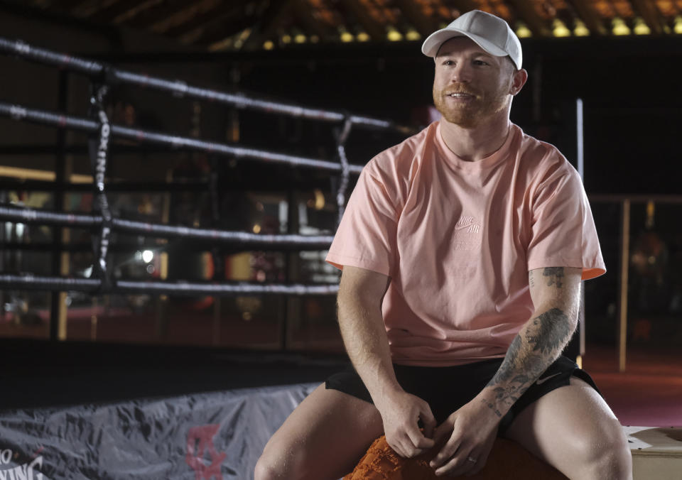 FILE - Saul "Canelo" Alvarez speaks during an interview at a gym in Guadalajara, Mexico, on April 17, 2023. “Canelo” Álvarez is one of the best boxers in the world and he will return home on Saturday to face British rival John Ryder at the Akron Stadium in the western Mexican city. He hasn't fought in Guadalajara since June 2011, when he defeated British fighter Ryan Rhodes. (AP Photo/Refugio Ruiz)