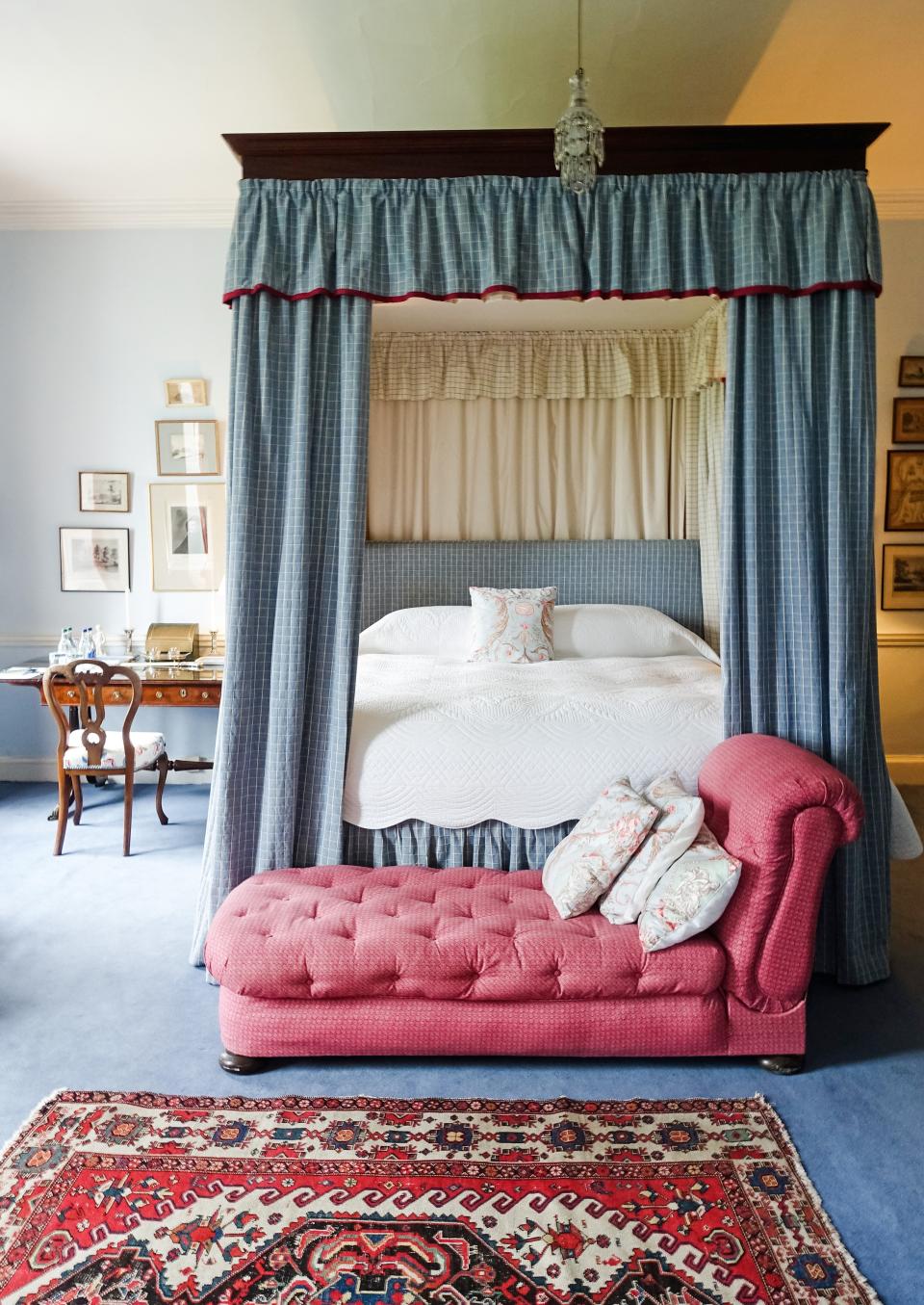 The pale blue walls of this bedroom (one of 18 in the castle) boast antique pictures and blue-and-white porcelain collected by Fitzgerald’s father. The bedrooms in the front of the castle overlook the Shannon Estuary (where the River Shannon flows to the Atlantic Ocean), while those in the back overlook the extensive lawns and well-manicured shrubs of the garden. Playing in the garden as a child is what inspired Fitzgerald to pursue her career as a landscape designer. “It’s not a huge garden but it’s a very special, magical garden,” says Fitzgerald. “I’ll plant hundreds of bulbs every winter and then they spread in the spring.”