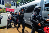 Police are seen outside a local government office following an explosion in Bandung, West Java, Indonesia February 27, 2017 in this photo taken by Antara Foto. Antara Foto/Novrian Arbi/ via REUTERS