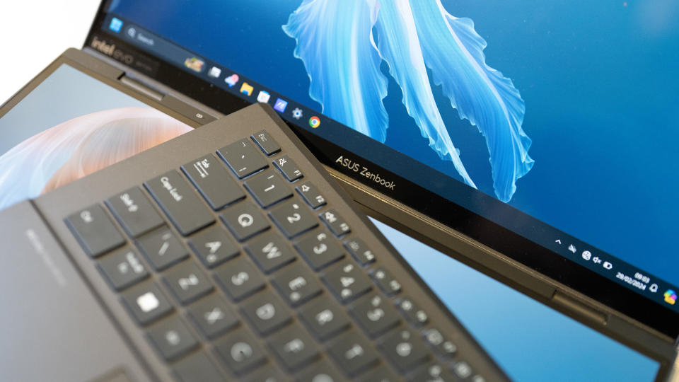 An ASUS Zenbook Duo OLED 2024 laptop on a white table