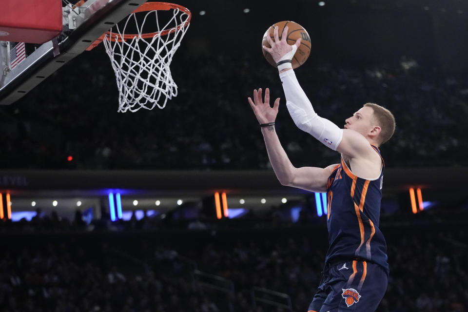 New York Knicks guard Donte DiVincenzo goes to the basket during the first half of an NBA basketball game against the Memphis Grizzlies, Tuesday, Feb. 6, 2024, at Madison Square Garden in New York. (AP Photo/Mary Altaffer)