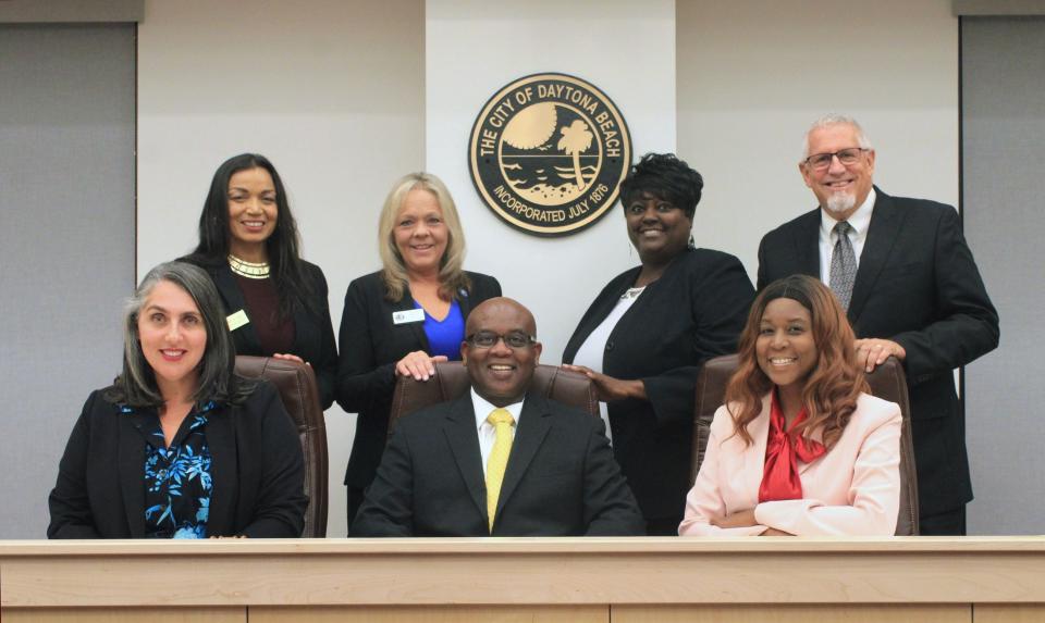 Daytona Beach city commissioners gave the city manager his first evaluation Wednesday night. Standing from left to right are City Commissioners Quanita May, Stacy Cantu, Paula Reed and Ken Strickland. Seated from left to right are City Commissioner Monica Paris, Mayor Derrick Henry and City Commissioner Dannette Henry.