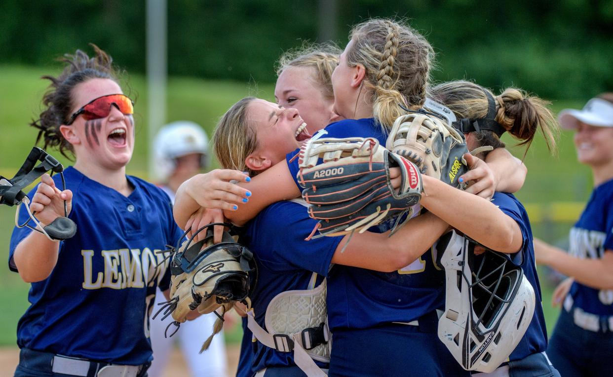 Lemont High School teammates celebrate their 1-0 victory over Metamora in the Class 3A state softball supersectional Monday, June 6, 2022 at EastSide Centre in East Peoria.