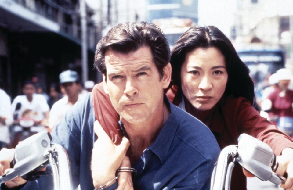 Pierce Brosnan and  Michelle Yeoh in “Tomorrow Never Dies” - Credit: ©United Artists/Courtesy Everett Collection