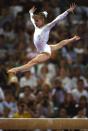 America's Shannon Miller on the balance beam in Barcelona at the Olympics August 1, 1992 when she tied for silver in the event with Lu Li of China. It was the fourth Olympic medal for Miller, a 15-year-old of Edmond, Okla. (AP Photo/Santiago Lyon)