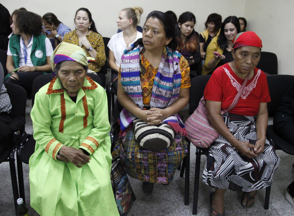 Friends and family of the murdered Honduran environmentalist Berta Caceres, sit in court for the trail of her Caceres’ murder, in Tegucigalpa, Honduras, Monday, Sept. 17, 2018. Honduras' supreme court has indefinitely suspended the start of the trial of eight men accused in the 2016 killing of Caceres, citing five related filings pending at the criminal appeals court that have to be resolved. (AP Photo/Fernando Antonio)